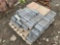 A PALLET OF MISC SIZE AND QTY GREY BRICKS AND