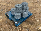 QTY OF (8) ROLLS OF BARBED WIRE