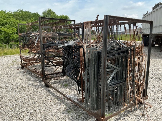 PALLET OF METAL TONGS AND METAL HANGING RACKS