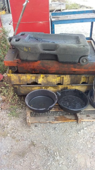 Oil catch basins and oil pump