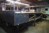 Wooden slat conveyor at chop saws