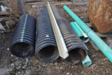 Assorted PVC Pipe and Black Tile