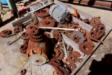 Lot of sprockets, pulleys, and shims