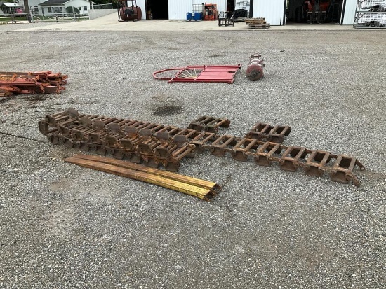 Over the Tire Grouser Skid Steer Tracks and Fork Extensions*