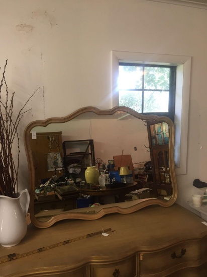 Gorgeous gold and serpentine wooden framed mirror with