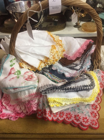 Basket full of nice handkerchiefs. Many handmade with crocheted borders