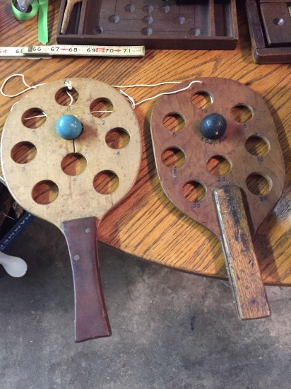 (2) Antique childrens paddle ball games. Different paddles.