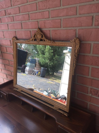 Gorgeous antique mirror in ornate gold gilt wooden frame