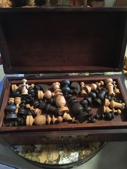 Carved miniature chess sets in wooden and brass box