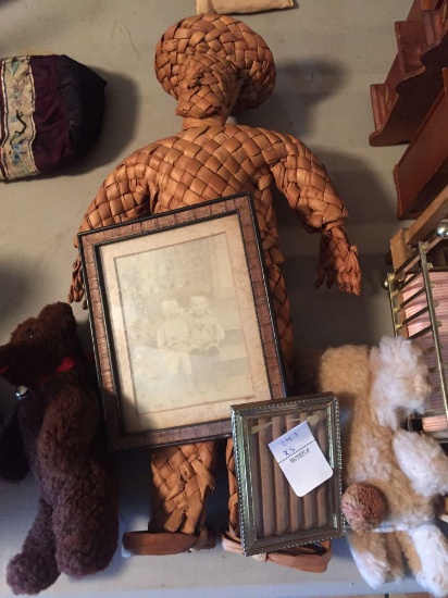 woven straw doll, two small stuffed bears and old frames