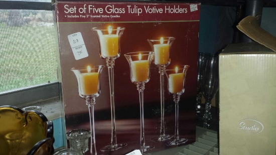 Set of 5 glass tulip votive holders with candles. In box.