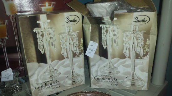 Two pair of silver plated candlesticks with crystal pendants from studio silversmiths. New In Box.