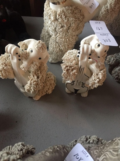 Pair of vintage porcelain spaghetti poodles playing insturments