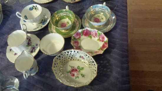 Set of 8 Charming teacups and accessories with varying designs