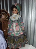 Beautiful Creole Late Century Porcelian Doll with Stand