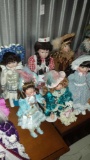 Lot of 6 Darling Porcelian Dolls. (2) Designs by Yoko - Nurse and Chocolate Dress