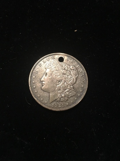 1921 holed Morgan silver dollar