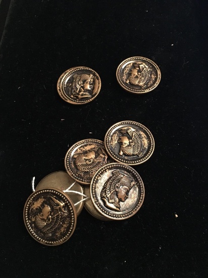 8 large Egyptian Revival metal buttons