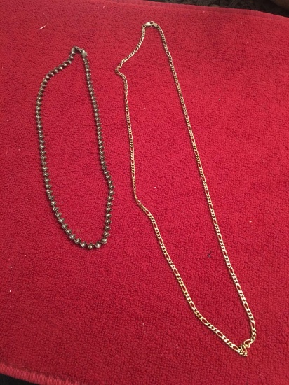 Two nice Sterling chains. One silver twisted and one 29.5 inch! gold washed