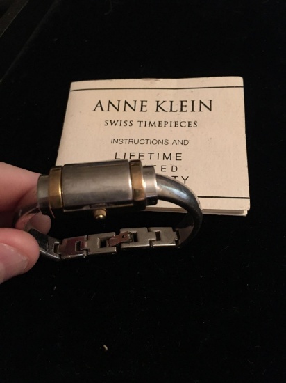 Anne Klein Swiss womans watch with clamshell face