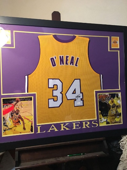 Fabulous authentic Signed Shaquille O?Neal jersey framed and matted With photos