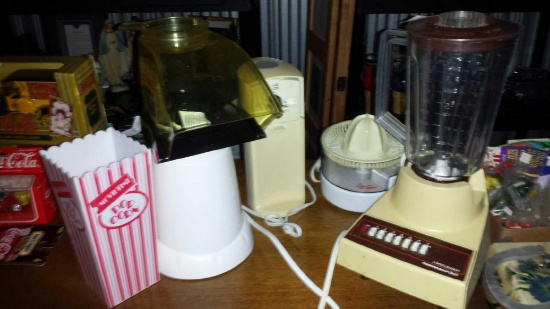(4) Appliances: popcorn popper with container, can opener, juicer, blender