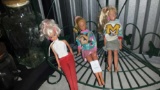3 collectible Barbies with included attire