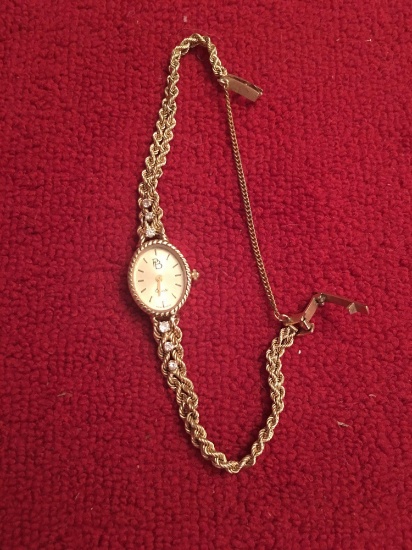 Beautiful Paul Breguette 14k gold with Diamond accents ladies watch.