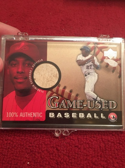 Vladimir Guerrero game used baseball swatch card. 2000 Upper Deck authentic