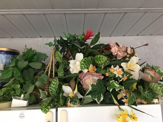 Large lot of silk floral arrangements in baskets