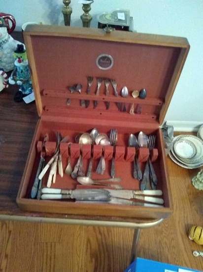 Nakens case and flatware inside 2 small Sterling spoons