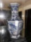 tall blue and white vase with Vining accents