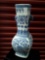 Very tall blue and white porcelain handled vase, flowers,