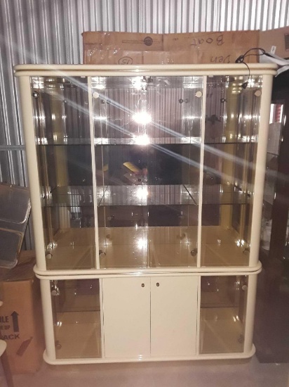Large Gorgeous lighted cream colored curio with multiple display spaces