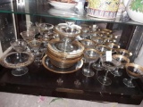 Large Lot of clear Glass Dishes with Gold Trim
