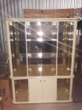 Large Gorgeous lighted cream colored curio with multiple display spaces