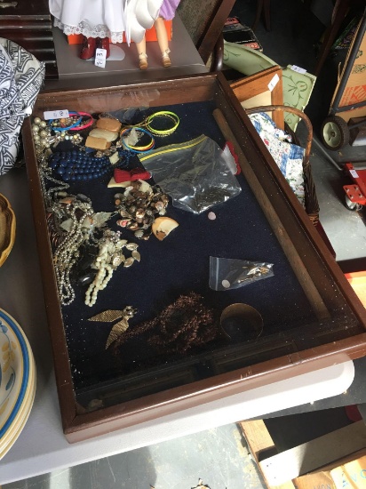 Large tabletop display case with contents