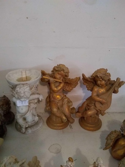 Three different Angel sculptures