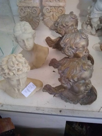 5 sculptures head and shoulders