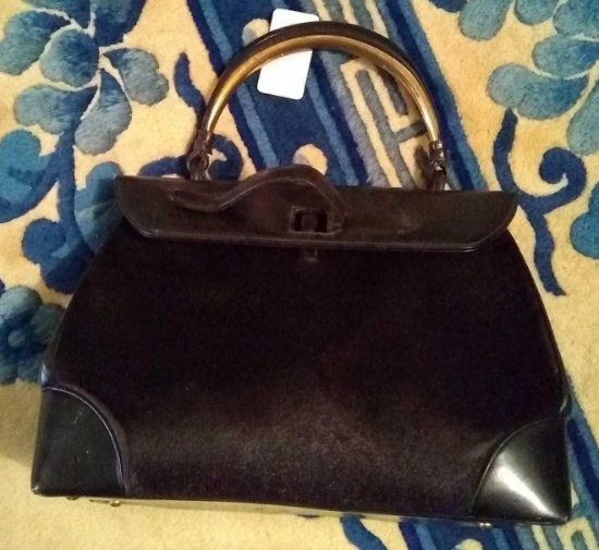 Nice black purse with soft fur sides