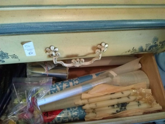 Drawer of candles and contact paper