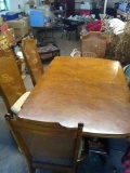 Dining Table with leaf and 6 chairs including two Captains chairs