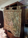 Victorian Tapestry Hanging From Decorative Pole
