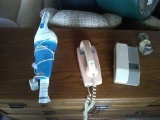 Black & Decker dustbuster handheld vac and two phones