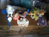 Lot of decorative items including ducks fruit basket and more
