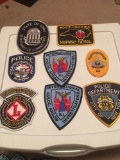 Lot of 8 police, fire and other service patches
