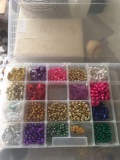 24 compartment plastic storage box with plastic beaded necklaces