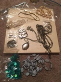 10 assorted necklaces