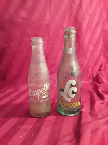 Two (2) Vintage Bottles, Lime Cola and Grapetta