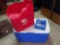 Blue Coleman cooler with drain spout, includes large freezer pack and reusable shopping bags